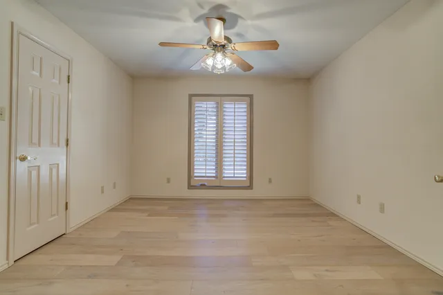 a kitchen with stainless steel appliances granite countertop a refrigerator and cabinets