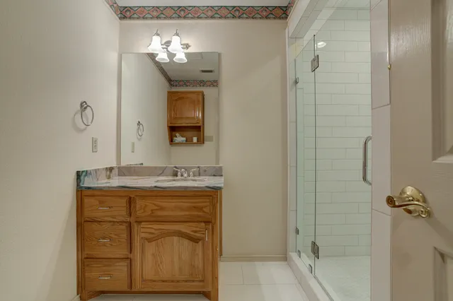 a view of a yard with a tree