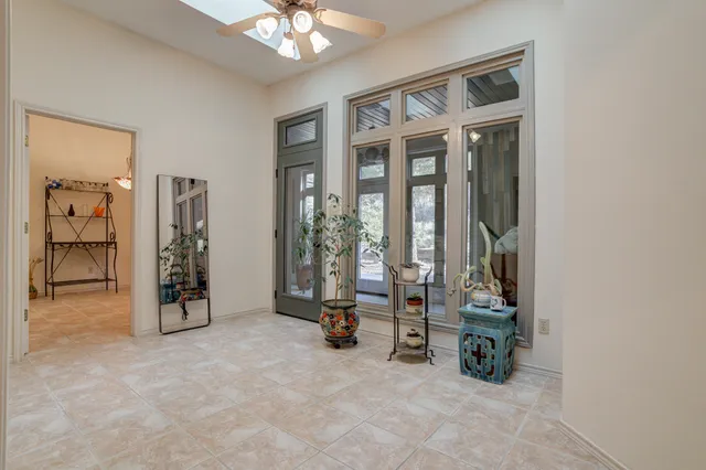 a view of a yard with large trees