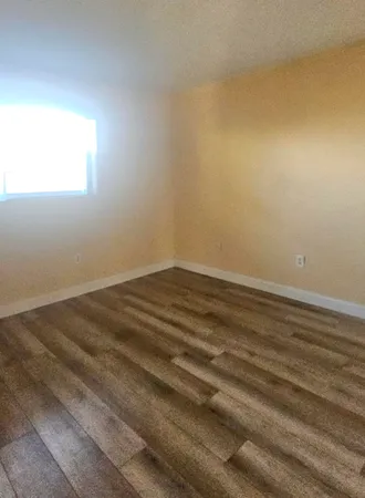 a view of a room that has a window in it