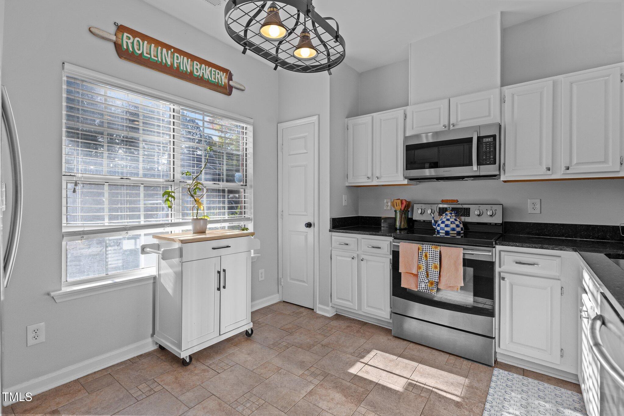 4448 Still Pines Drive Raleigh, NC 27613 - Photo 3 of 35 14-web-or-mls-8Y3A5923