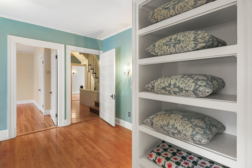 61 William Street Worcester, MA 01609 - Photo 20 of 42 walk in closet with wooden floor