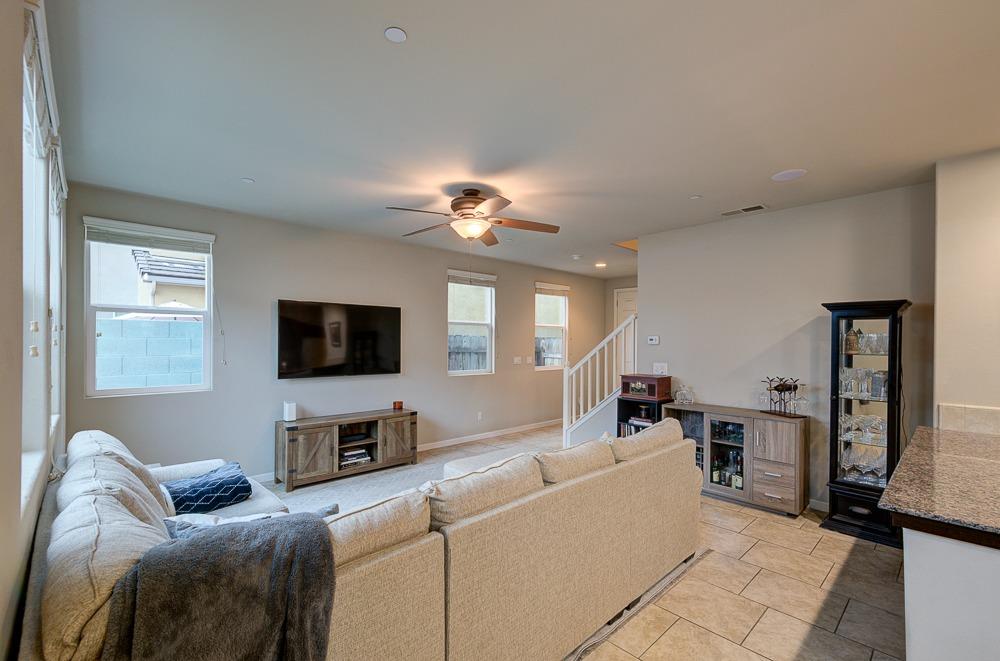3518 Significant Way Clovis, CA 93619 - Photo 13 of 34 a living room with furniture and a flat screen tv