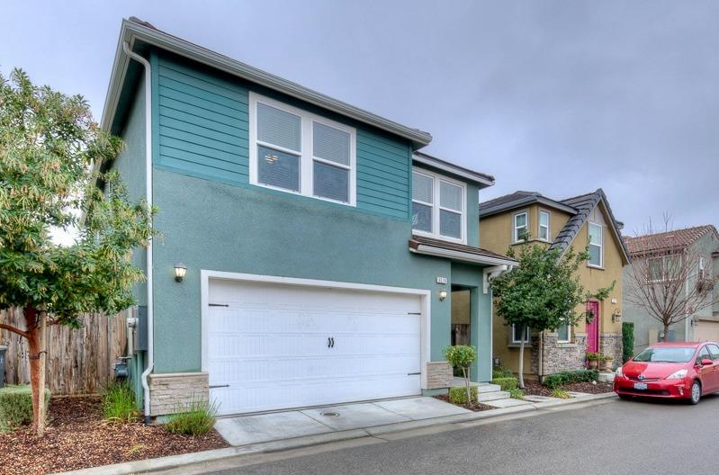 3518 Significant Way Clovis, CA 93619 - Photo 33 of 34 a car parked in front of a house