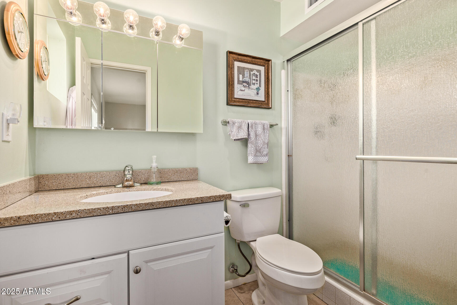 5501 East Adobe Road Mesa, AZ 85205 - Photo 14 of 38 a bathroom with a granite countertop toilet sink and mirror