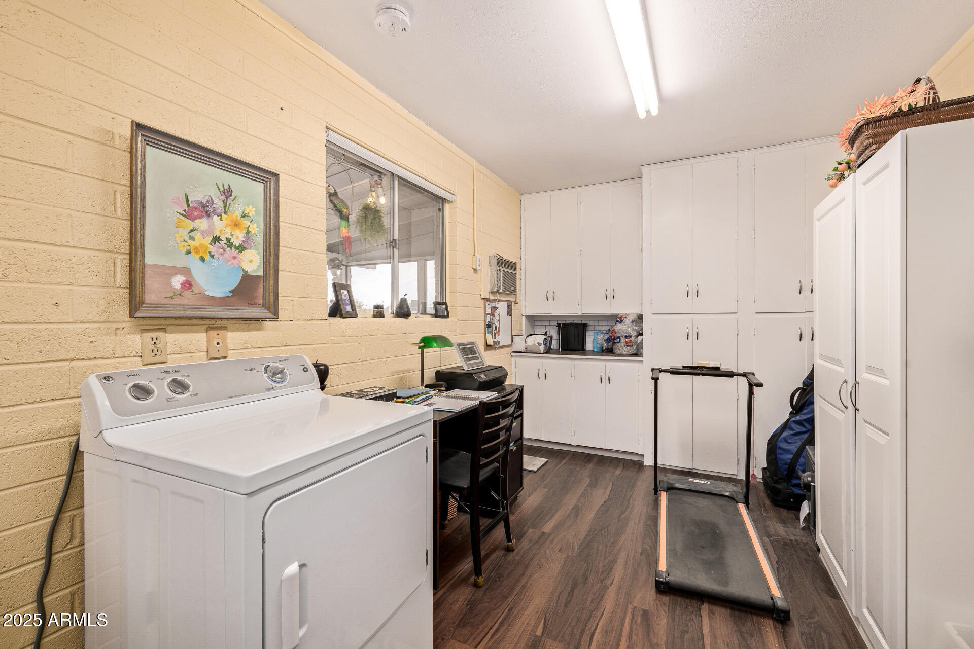 5501 East Adobe Road Mesa, AZ 85205 - Photo 21 of 38 a utility room with cabinets washer and dryer