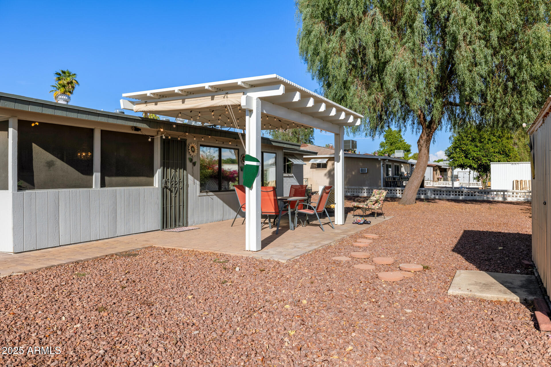 5501 East Adobe Road Mesa, AZ 85205 - Photo 23 of 38 a view of a building with a patio