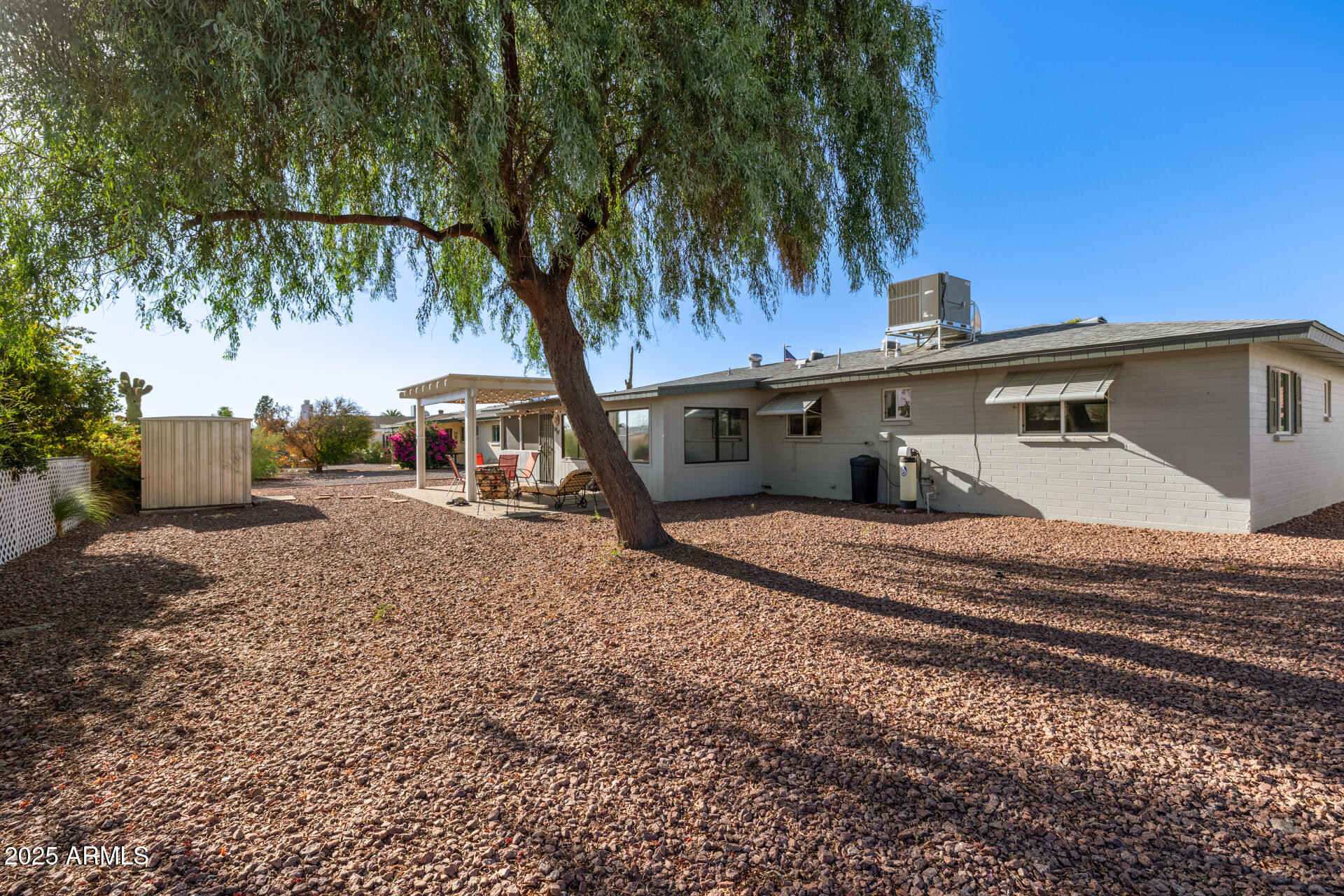 5501 East Adobe Road Mesa, AZ 85205 - Photo 24 of 38 a front view of a house with garden