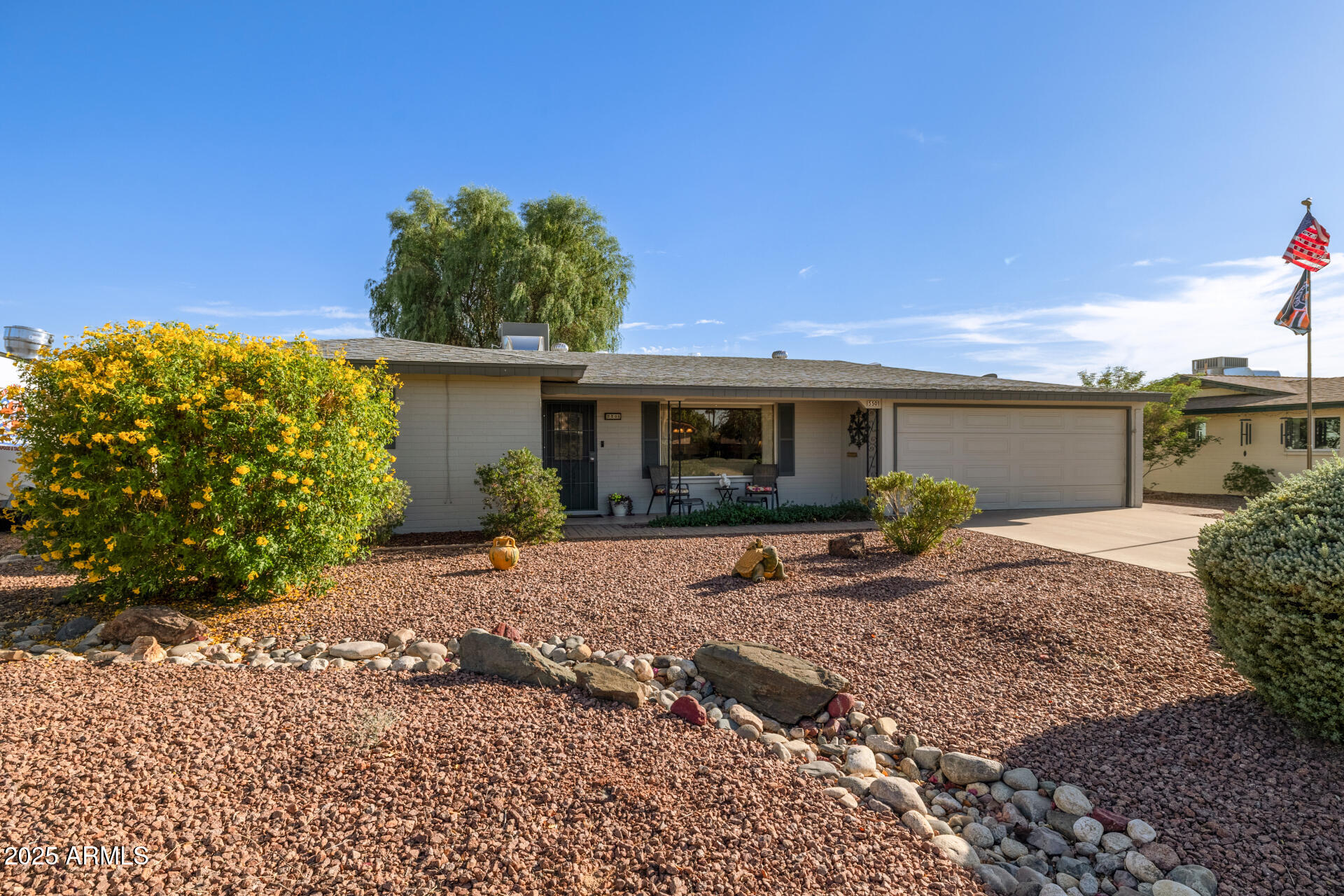5501 East Adobe Road Mesa, AZ 85205 - Photo 28 of 38 a front view of a house with a yard