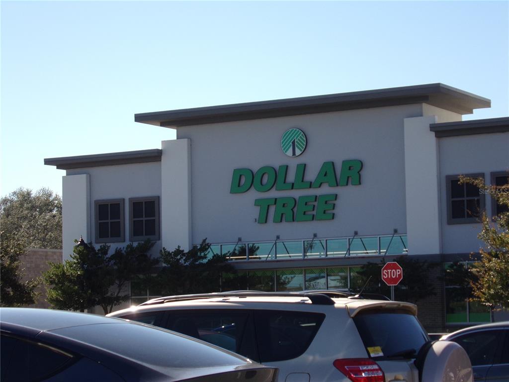 154 Tuskawilla Road, Unit 224 Winter Springs, FL 32708 - Photo 21 of 35 a view of a house with backyard sitting area and furniture