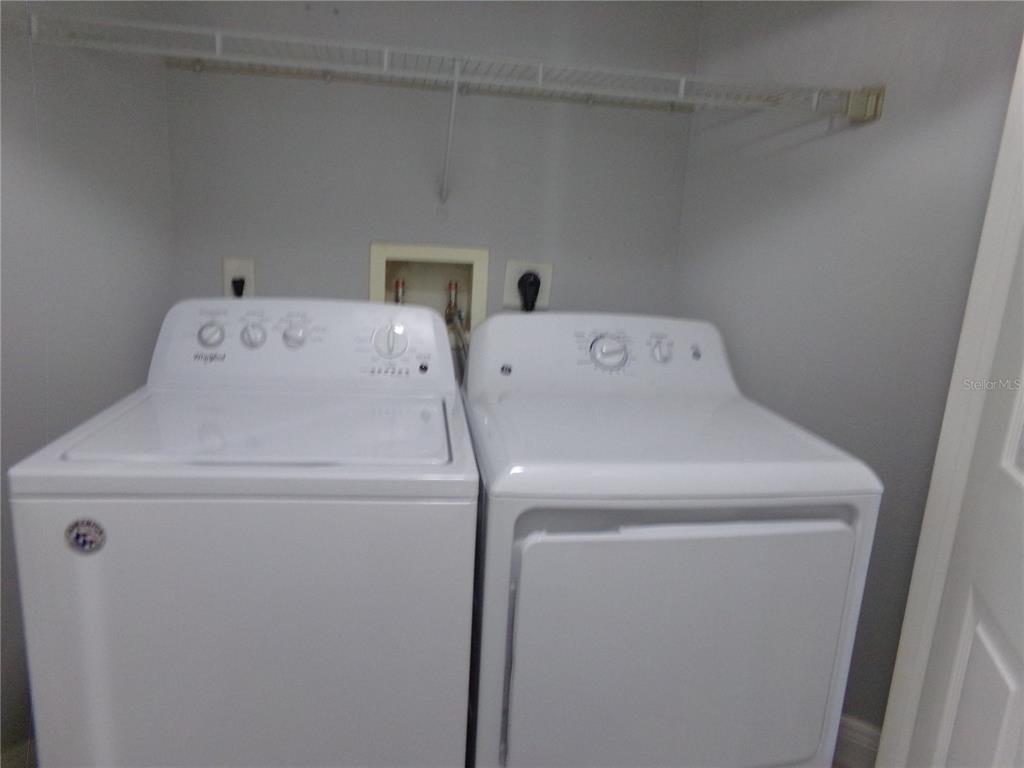 154 Tuskawilla Road, Unit 224 Winter Springs, FL 32708 - Photo 24 of 35 a utility room with dryer and washer