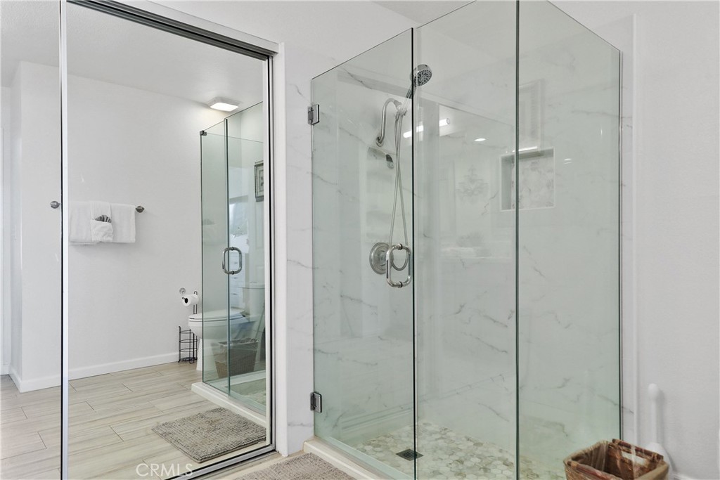 74 Avenida Las Palmas Rancho Mirage, CA 92270 - Photo 15 of 23 a bathroom with a shower and a sink