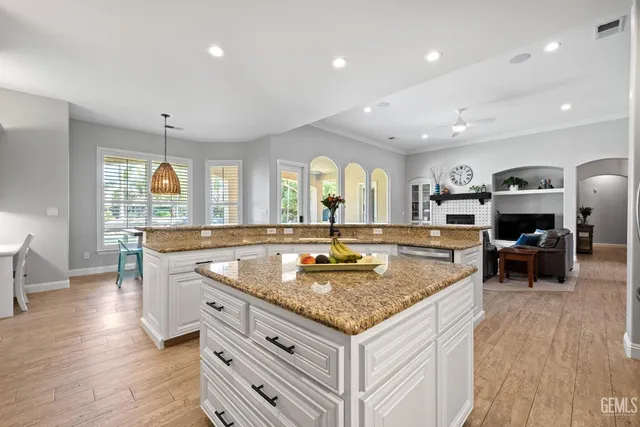a bathroom with a double vanity sink mirror and double