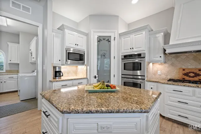 a bathroom with a shower and a sink