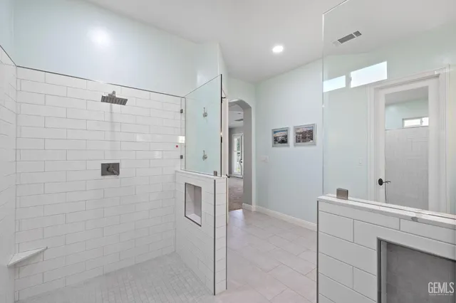 a view of a house with backyard porch and sitting area