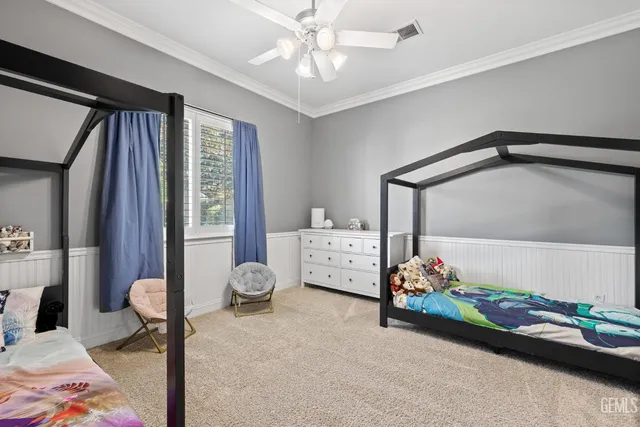 a view of a livingroom with furniture and a flat screen tv