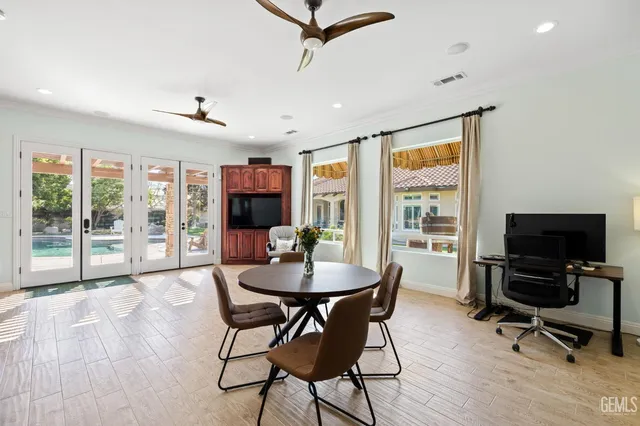 an aerial view of multiple houses with yard