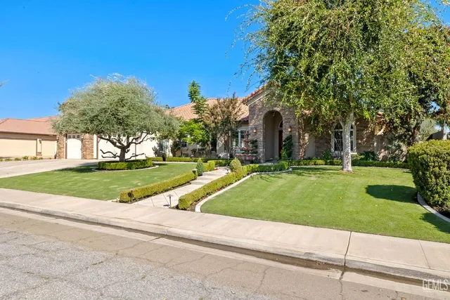 a view of swimming pool with a garden