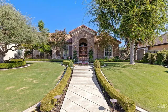 a front view of a house with swimming pool