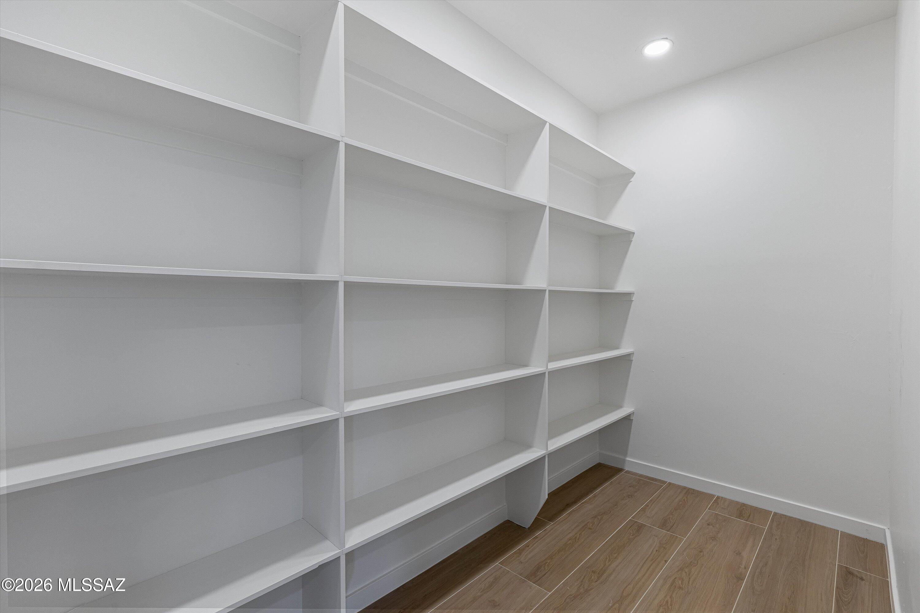 5259 East Fort Lowell Road Tucson, AZ 85712 - Photo 16 of 50 a view of walk in closet with empty racks