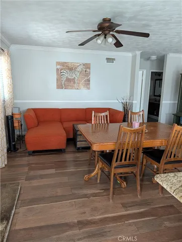 a view of a livingroom with furniture and a table