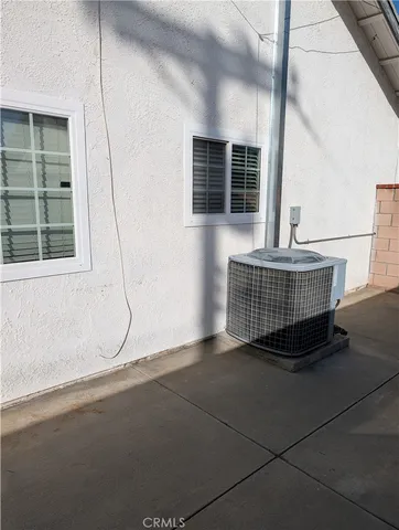 a view of staircase with white walls