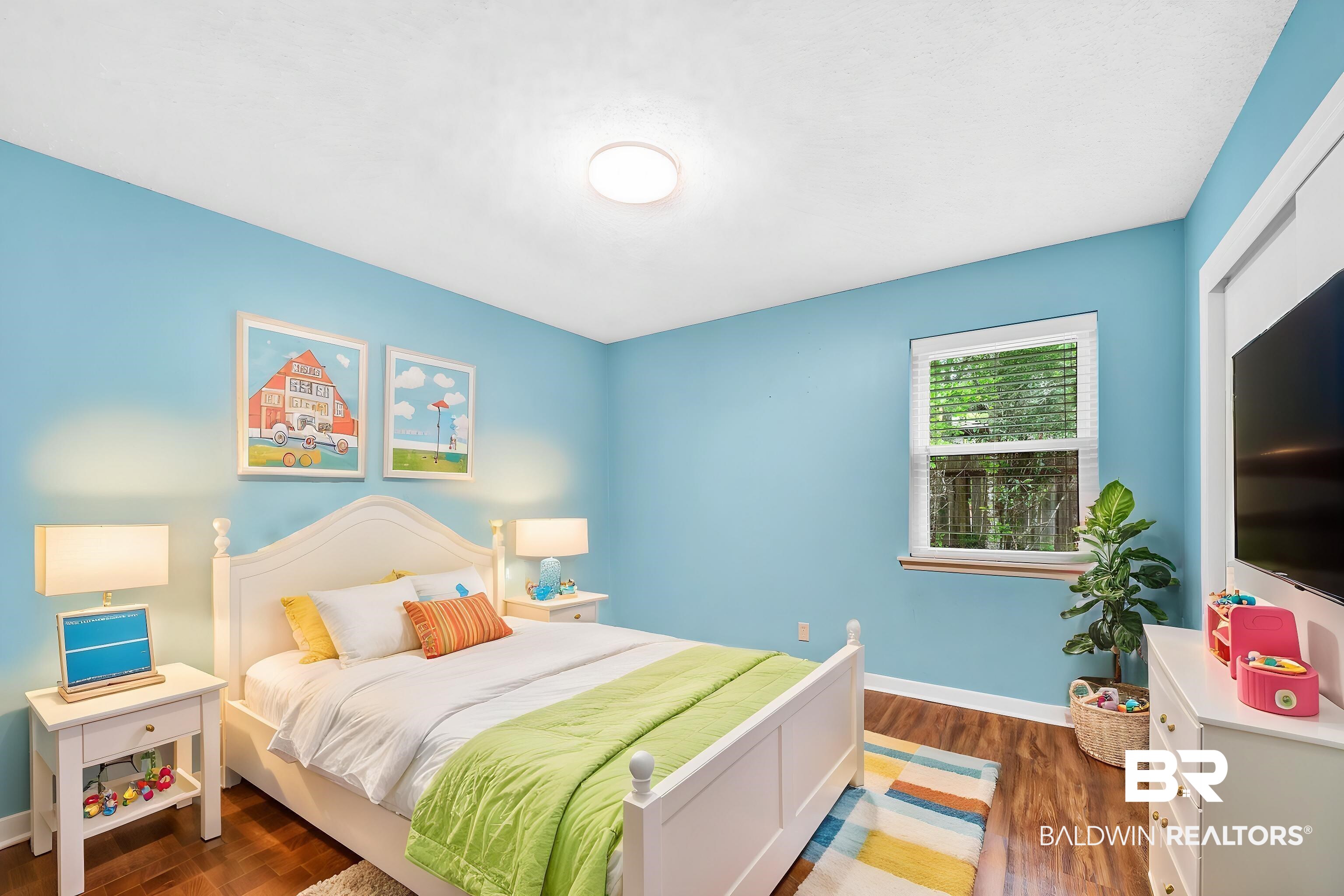 28 Caisson Trace Spanish Fort, AL 36527 - Photo 30 of 51 Bedroom featuring wood finished floors and baseboards