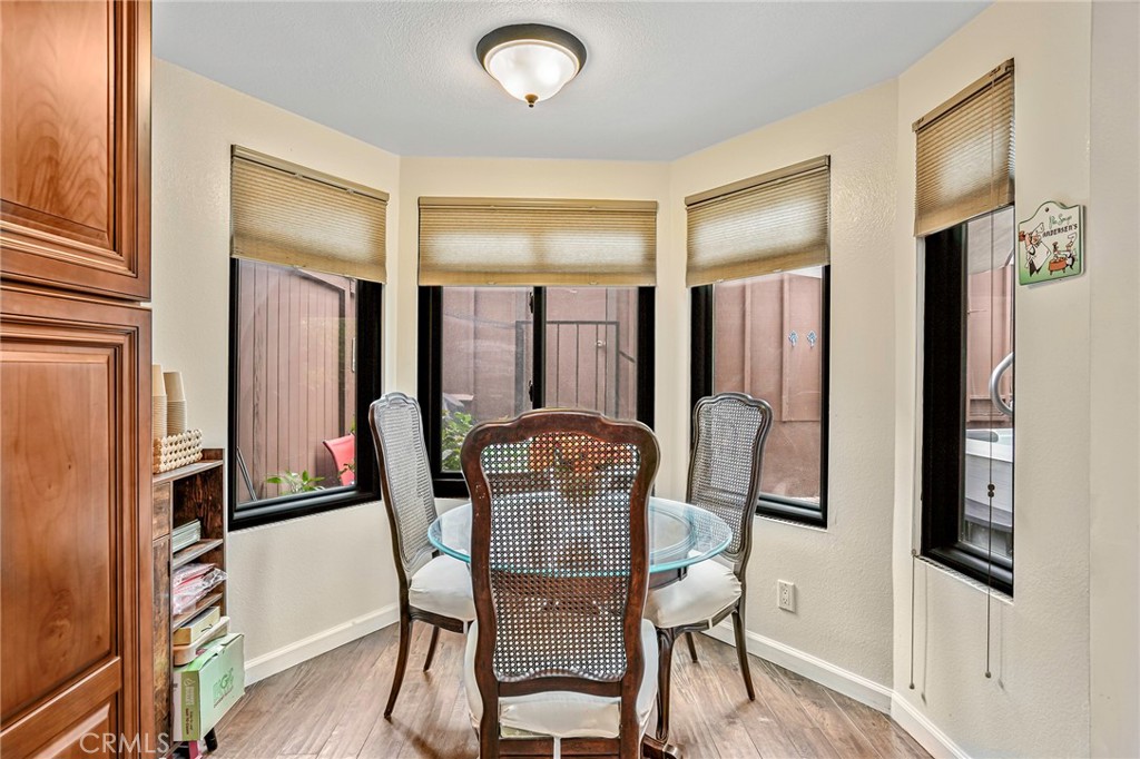 1642 Dalmatia Drive San Pedro, CA 90732 - Photo 10 of 26 a view of a dining room with furniture and a window