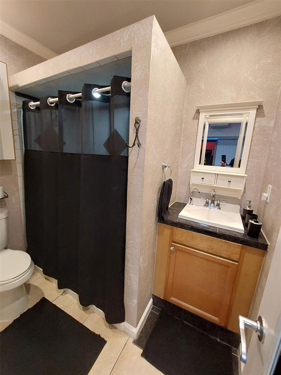 5770 Northwest 191st Terrace Hialeah, FL 33015 - Photo 11 of 17 a bathroom with a sink toilet and shower