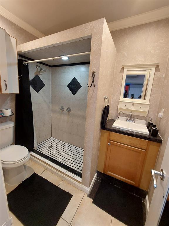 5770 Northwest 191st Terrace Hialeah, FL 33015 - Photo 12 of 17 a bathroom with a sink and a shower