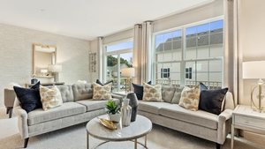 561 Wolverine Drive Aurora, IL 60502 - Photo 7 of 17 a living room with furniture and a large window