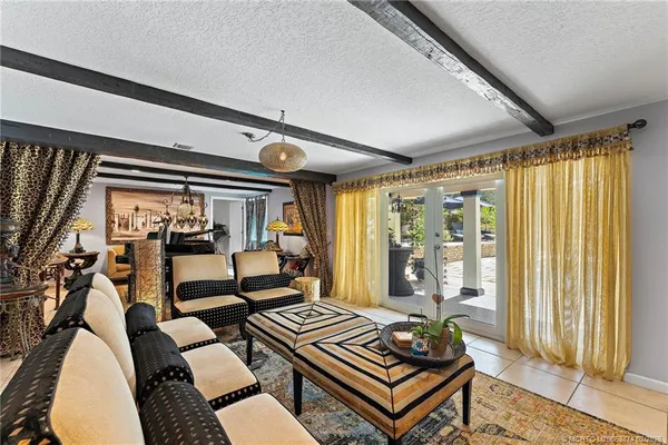 $1,299,000 | 1430 Southwest Covered Bridge Drive, Palm City, FL 34990