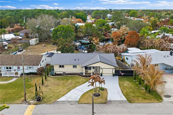 $1,299,000 | 1430 Southwest Covered Bridge Drive, Palm City, FL 34990