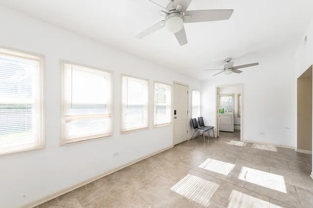 a utility room with closet dryer and washer