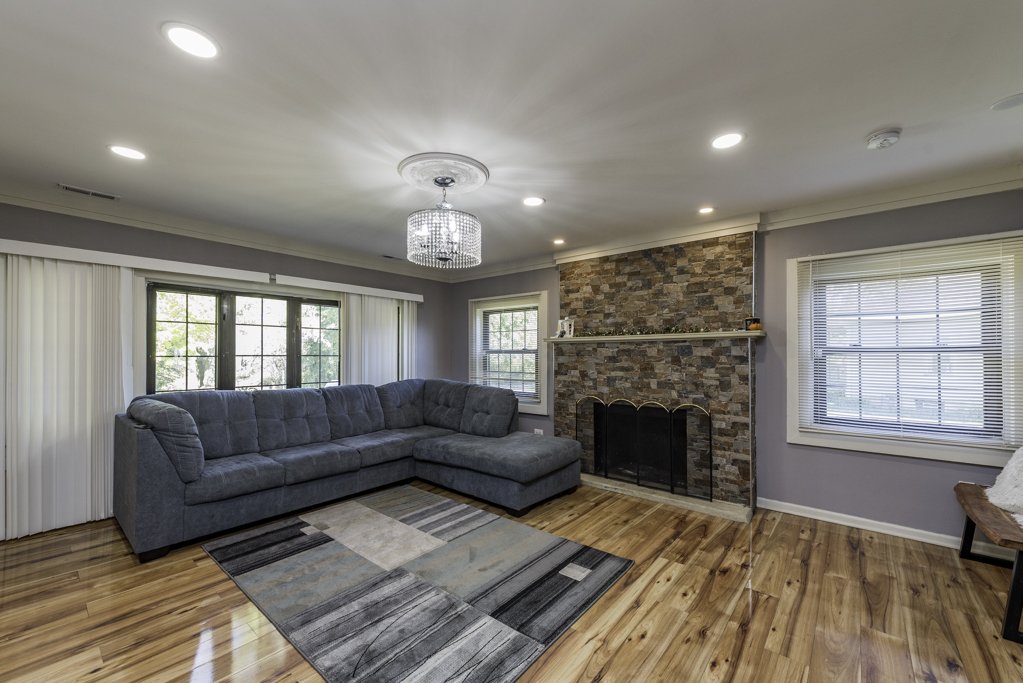 1700 Gideon Avenue Zion, IL 60099 - Photo 7 of 33 a living room with furniture and a fireplace