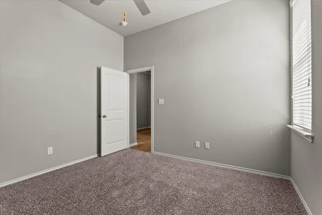 a bathroom with a bathtub and a toilet