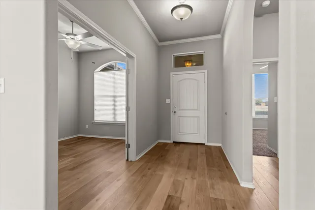 a view of empty room with windows