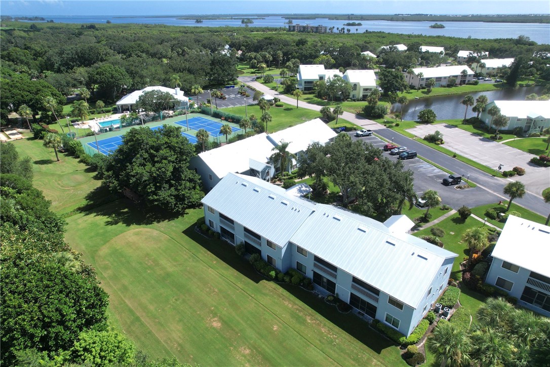 9635 Riverside Drive, Unit 4 Sebastian, FL 32958 - Photo 32 of 34 a view of a house with a yard and lake view