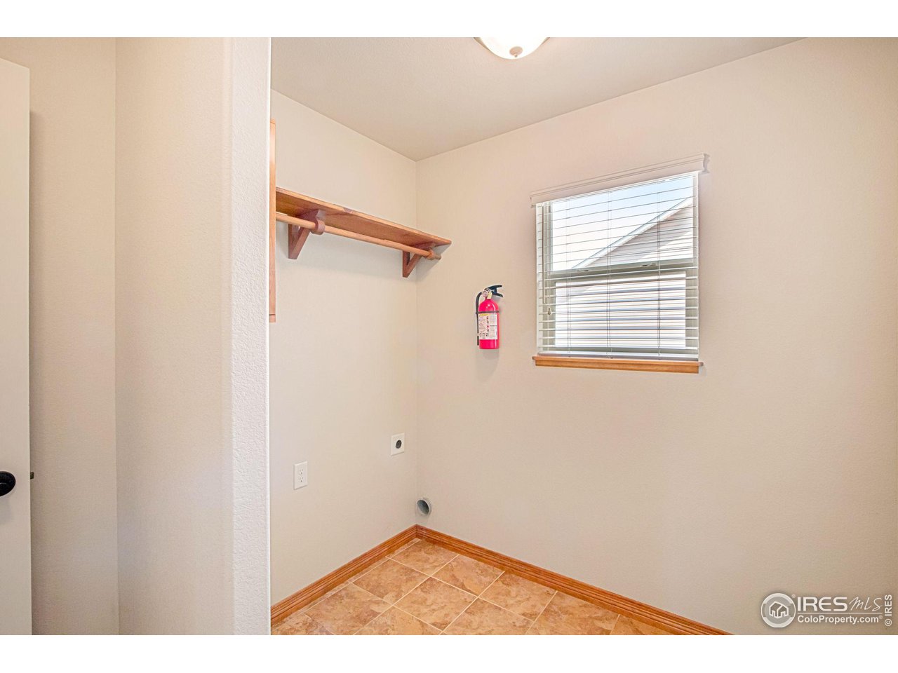 6875 McClellan Road Wellington, CO 80549 - Photo 17 of 33 Main level laundry room for your convenience, off garage