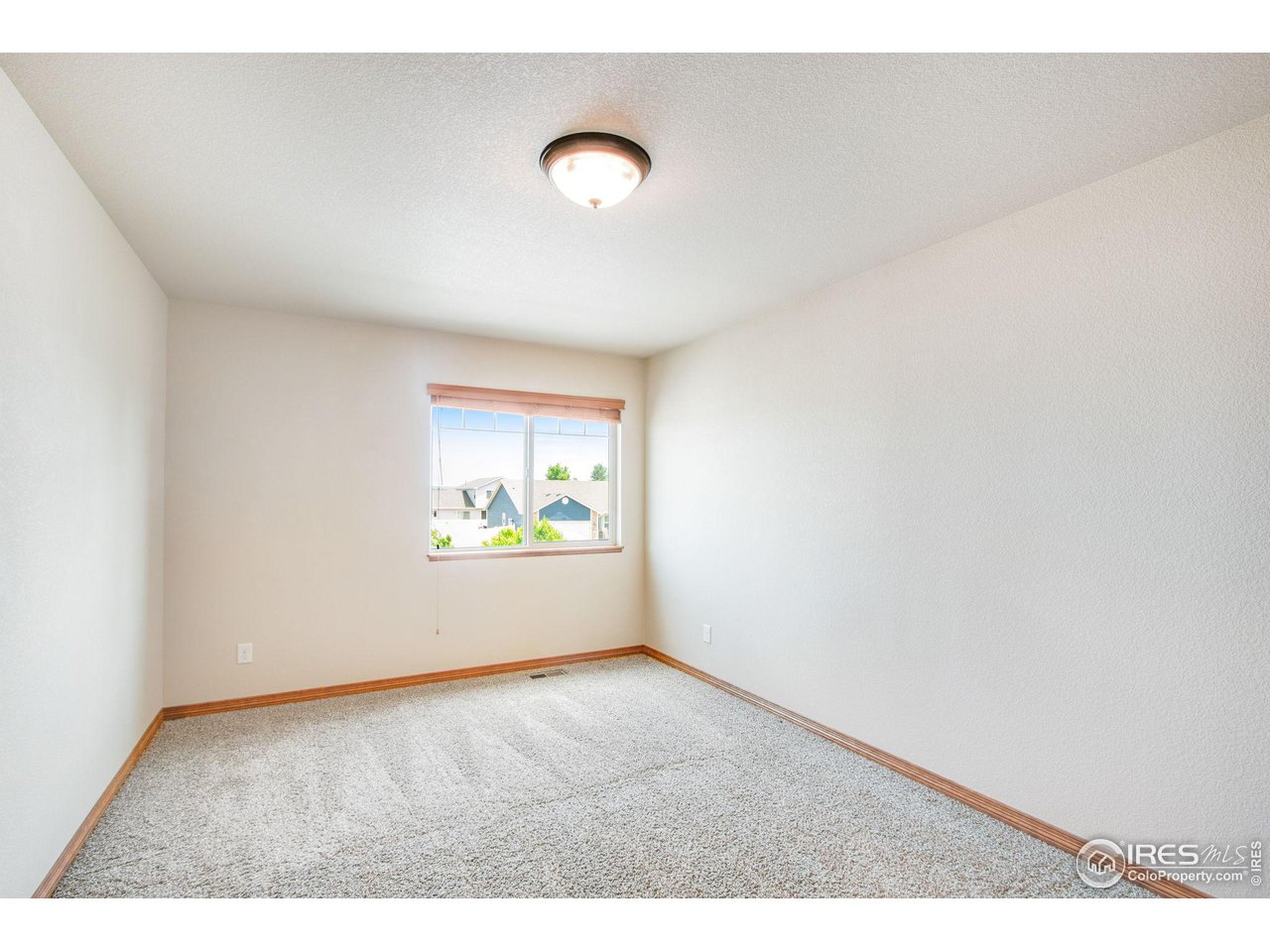 6875 McClellan Road Wellington, CO 80549 - Photo 25 of 33 3rd upstairs bedroom