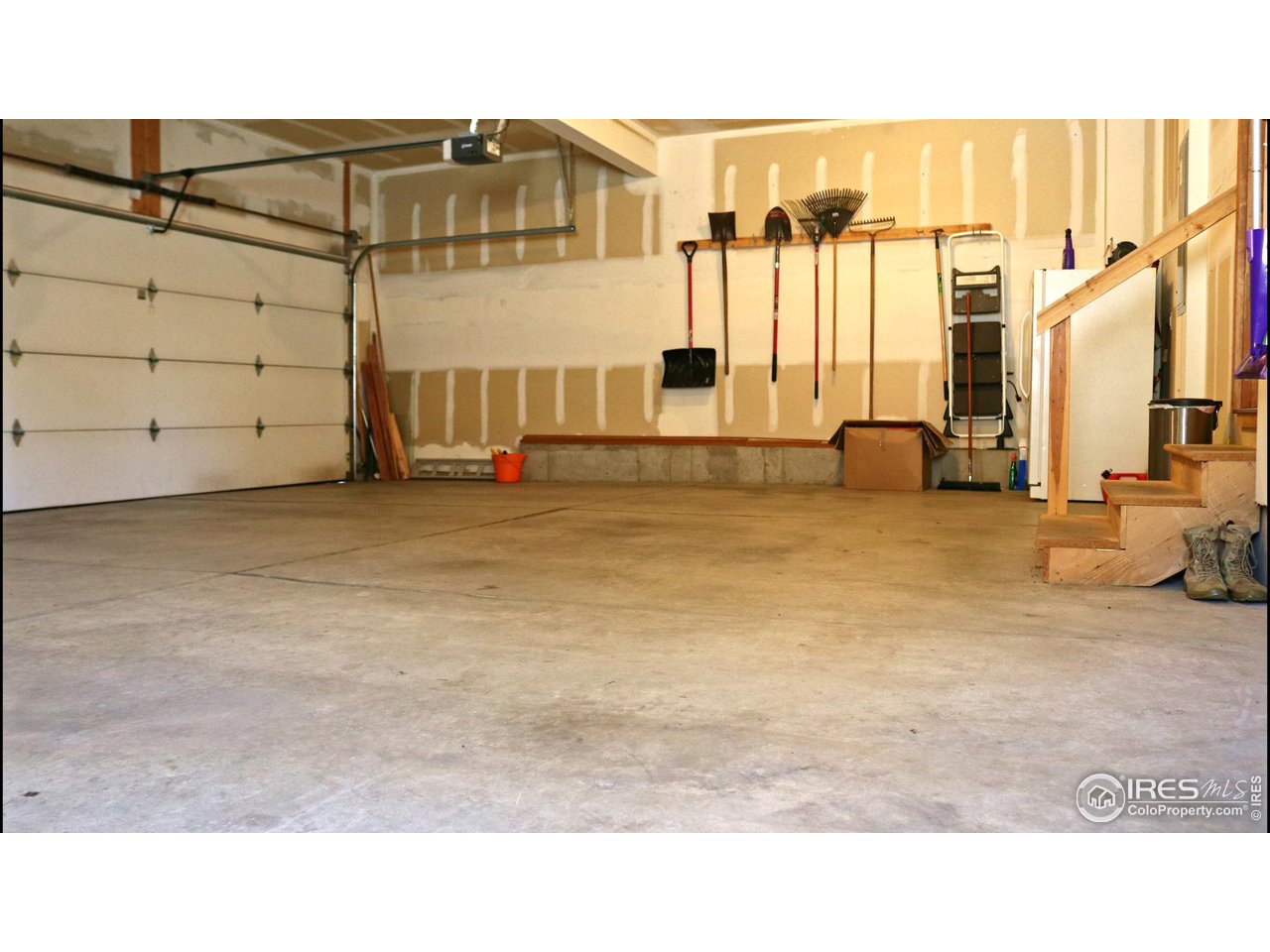 6875 McClellan Road Wellington, CO 80549 - Photo 31 of 33 Large garage for all your vehicle and storage needs!
