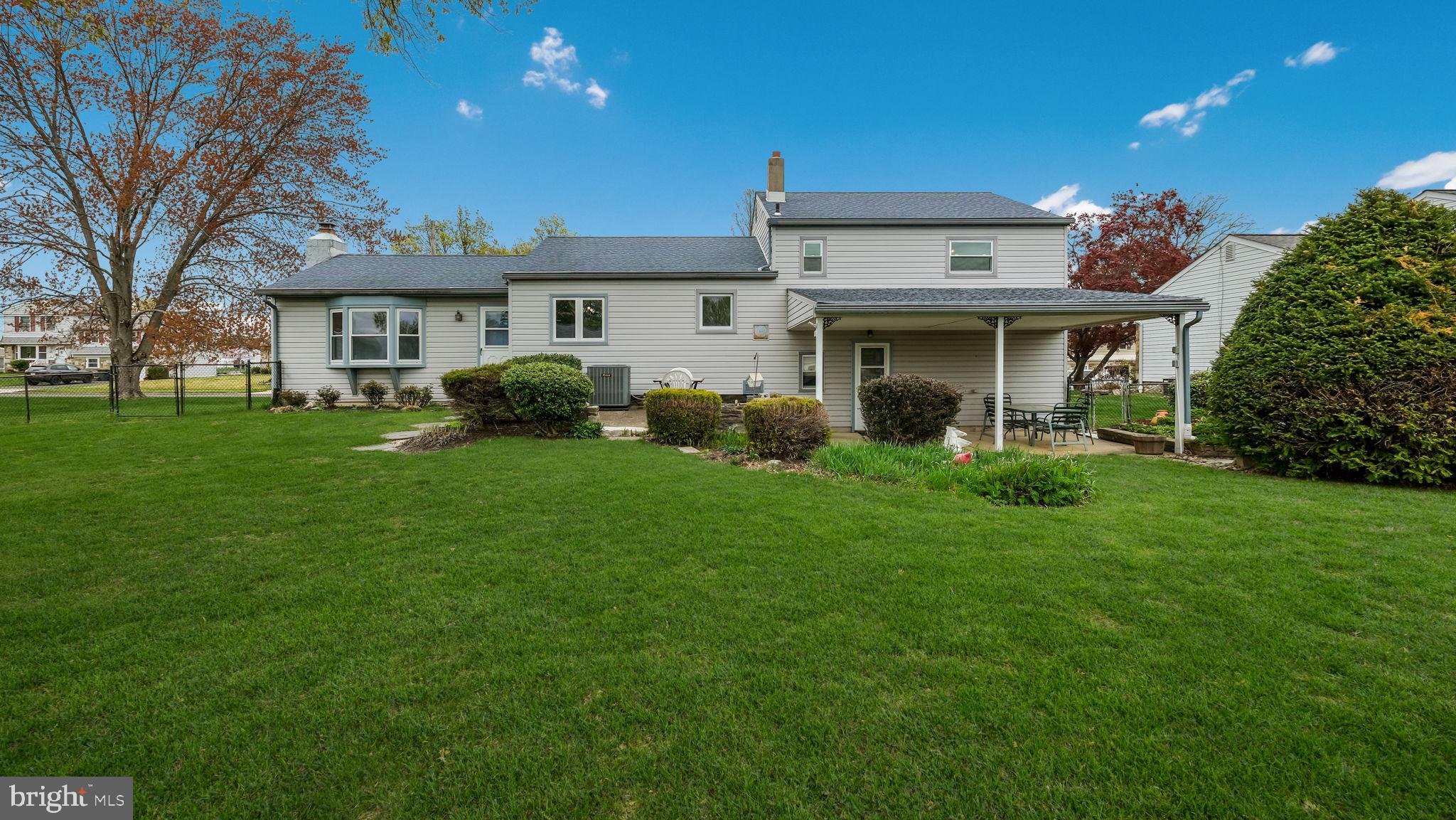 1243 Tulip Road Warminster, PA 18974 - Photo 27 of 33 a front view of a house with garden and porch
