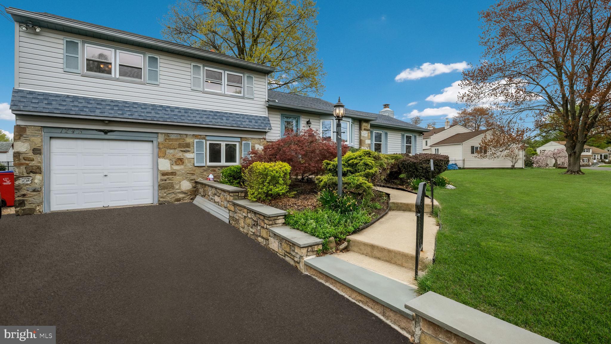 1243 Tulip Road Warminster, PA 18974 - Photo 3 of 33 a house view with a garden space