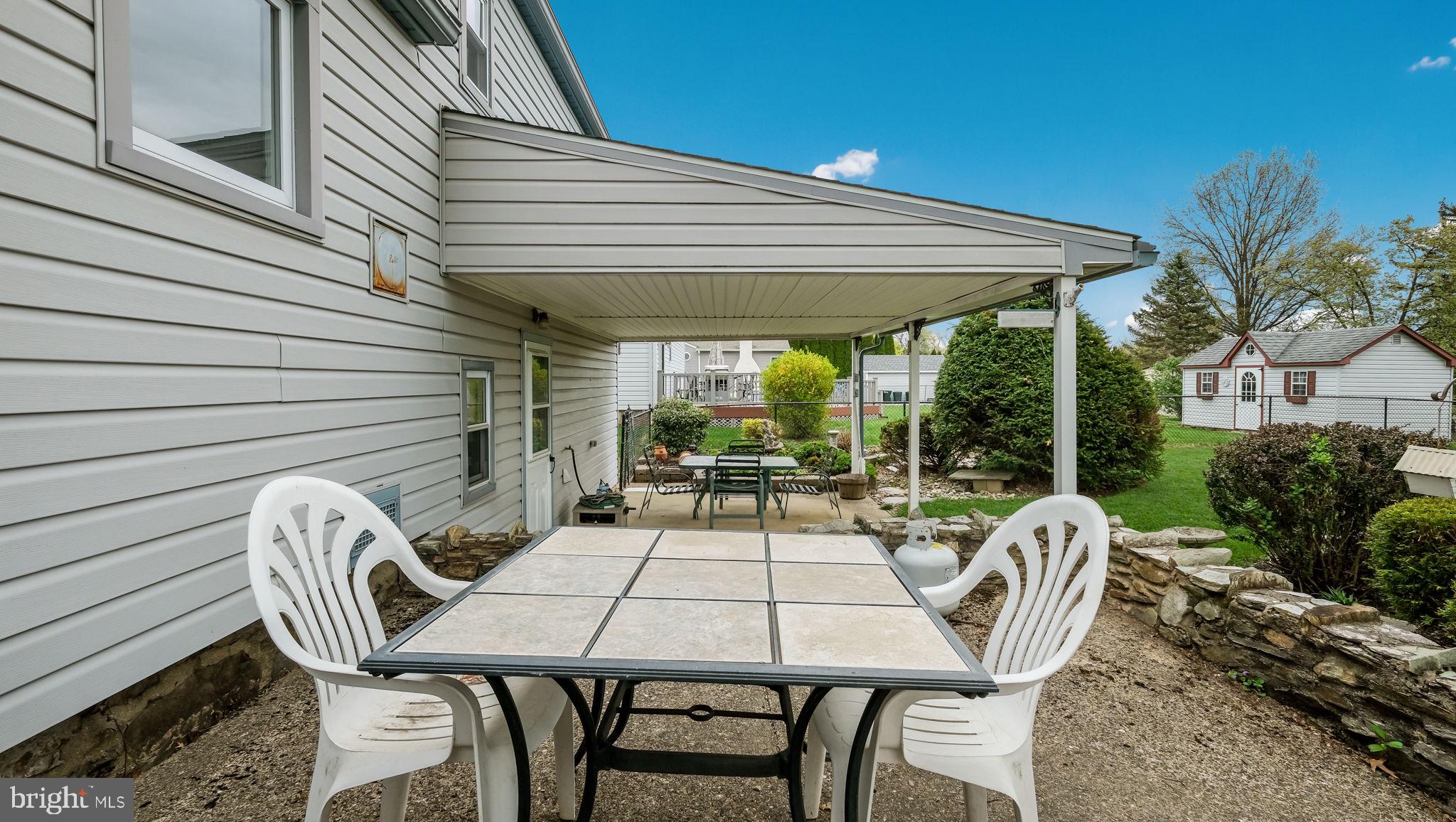 1243 Tulip Road Warminster, PA 18974 - Photo 31 of 33 a view of a chairs and table in patio