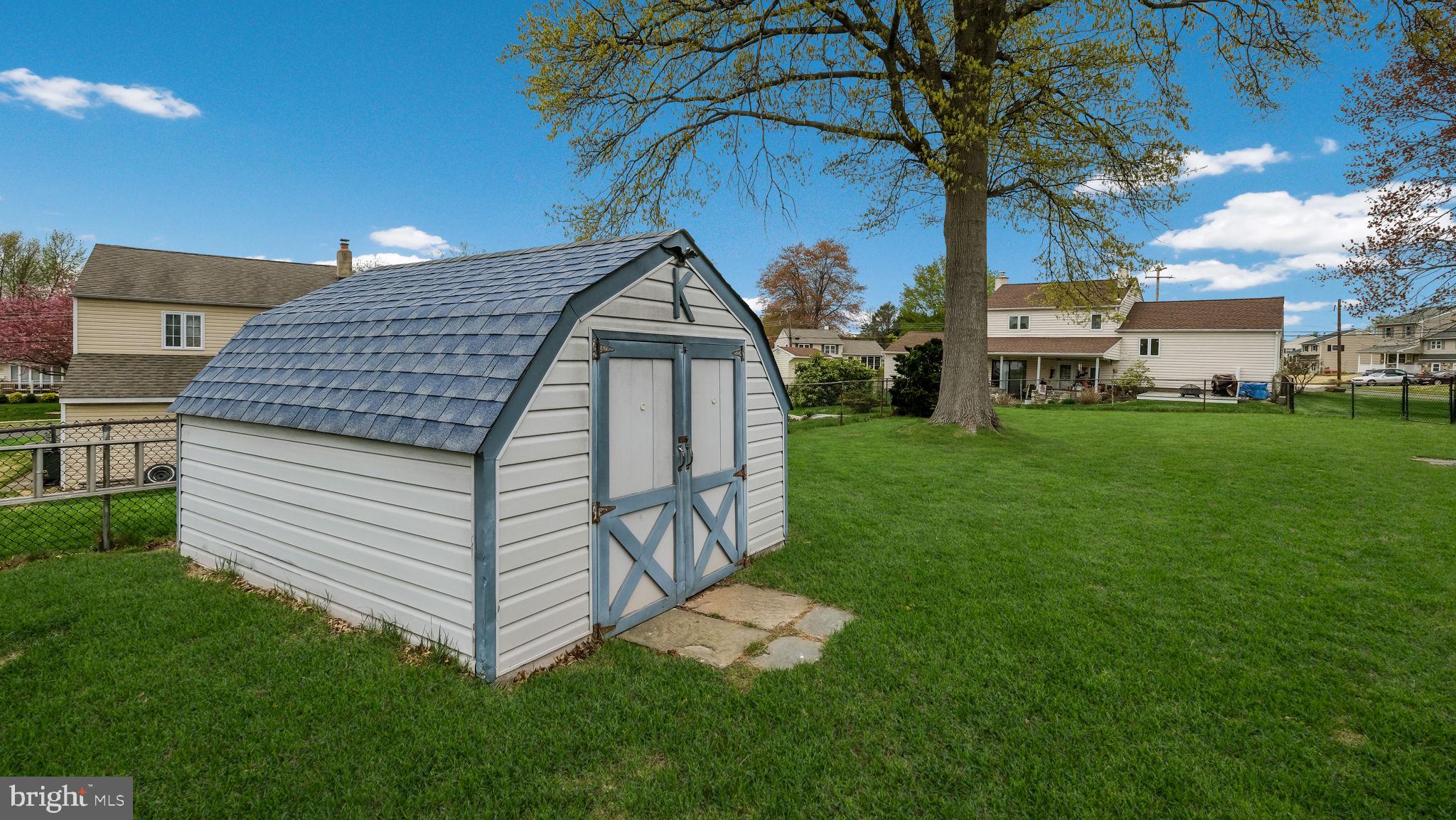 1243 Tulip Road Warminster, PA 18974 - Photo 33 of 33 a view of a house with a yard