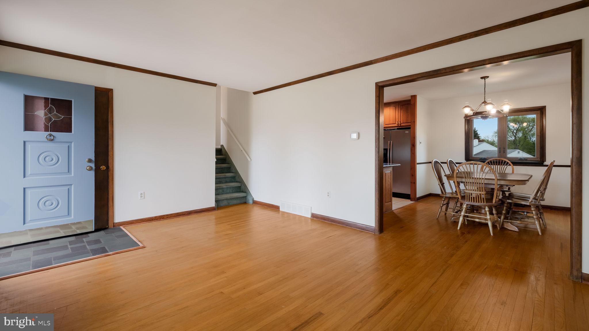 1243 Tulip Road Warminster, PA 18974 - Photo 8 of 33 a view of a livingroom with furniture and wooden floor