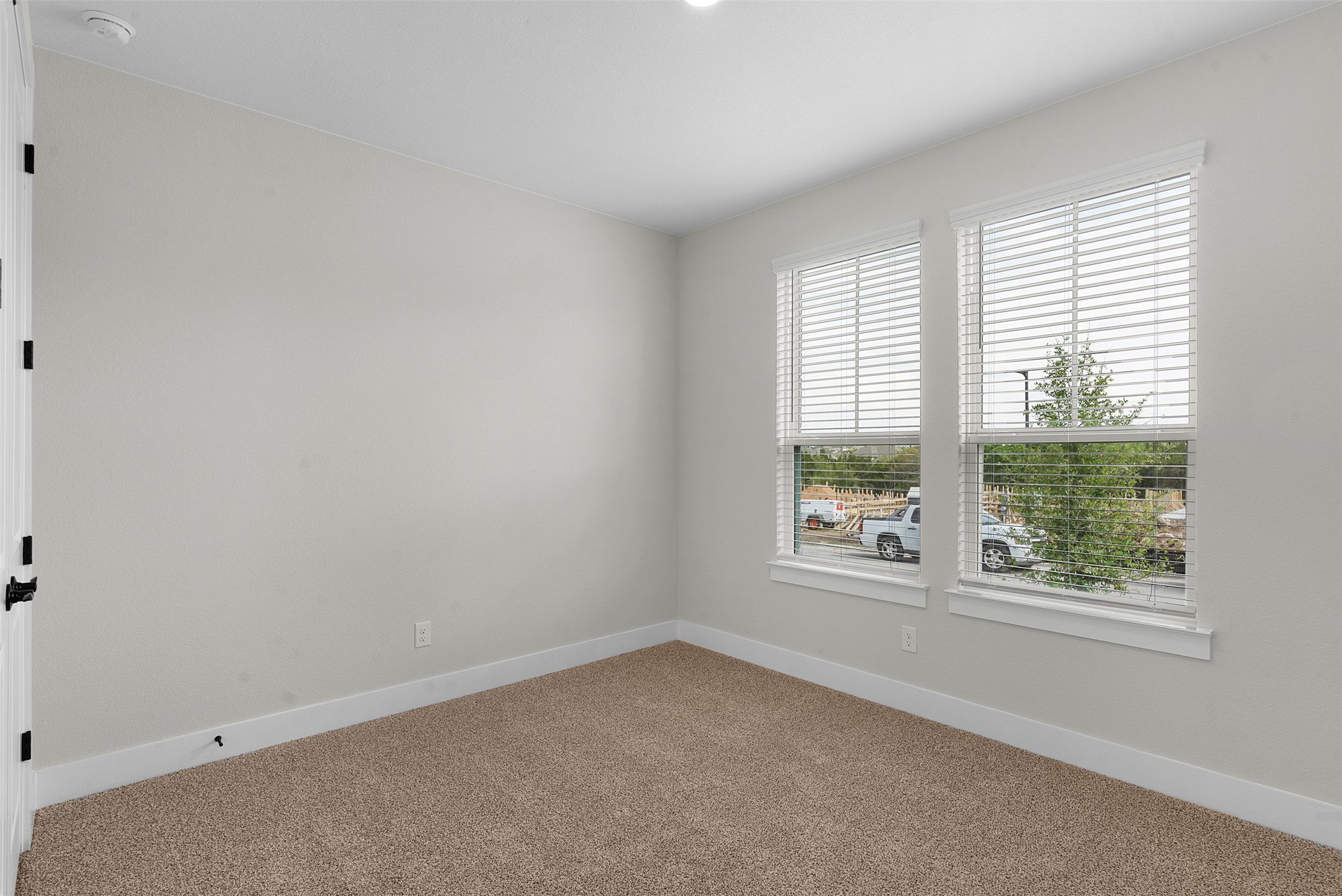 1121 Pansy Trail Georgetown, TX 78628 - Photo 4 of 25 Spare room with baseboards and carpet