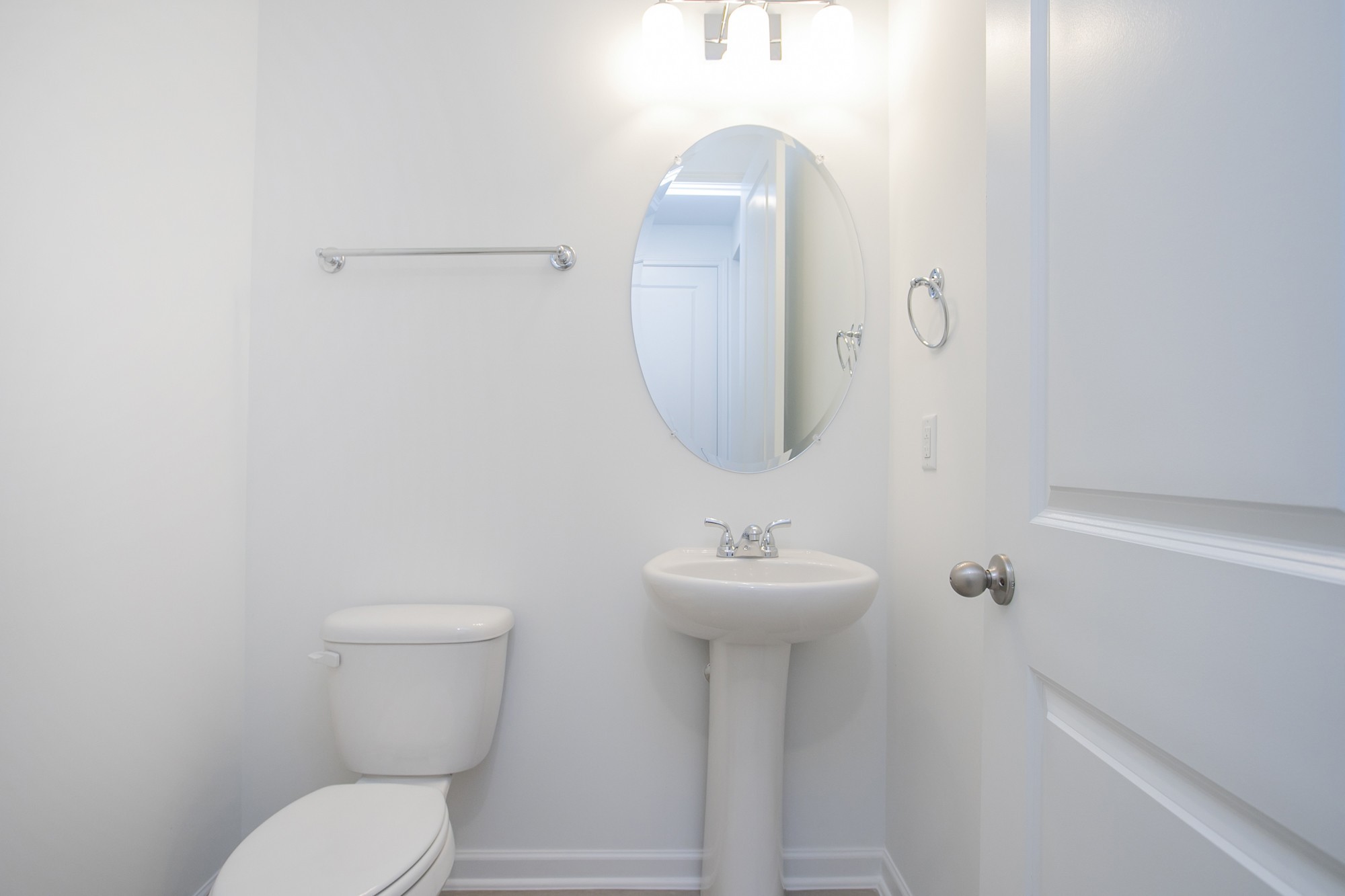 625 Maple Bend Dickson, TN 37055 - Photo 15 of 45 a bathroom with a toilet sink and mirror