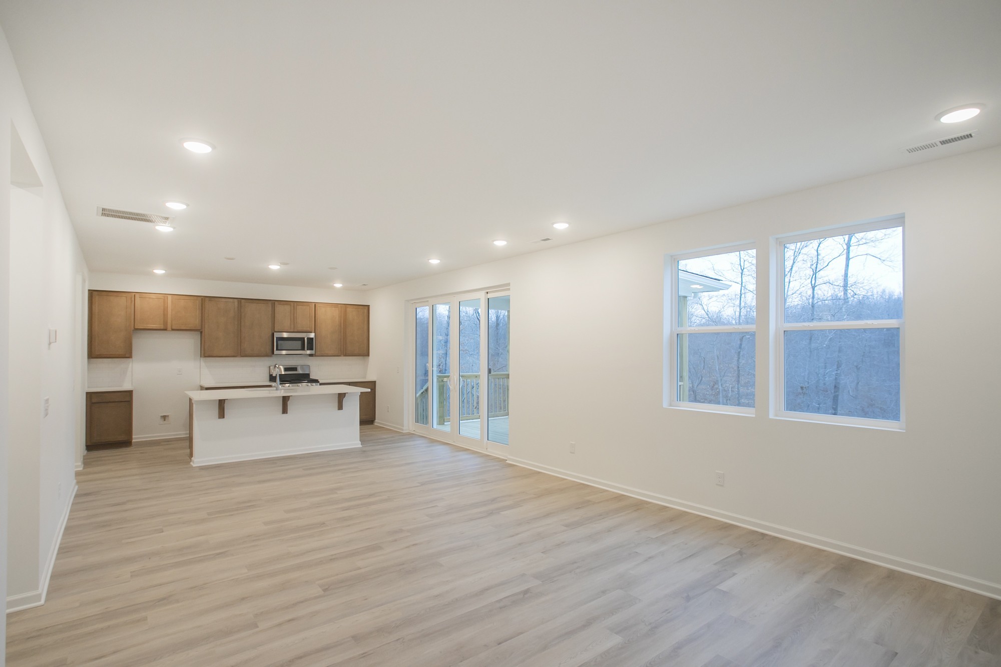 625 Maple Bend Dickson, TN 37055 - Photo 16 of 45 a living room with stainless steel appliances kitchen island wooden floor and view living room