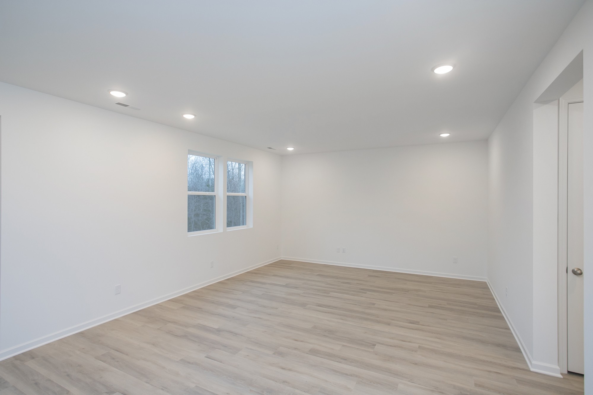 625 Maple Bend Dickson, TN 37055 - Photo 19 of 45 a view of empty room with wooden floor and fan